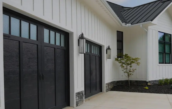 Damaged Garage Door Panels: When to Repair a Section vs. Replace the Whole Door