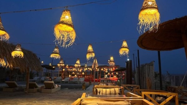 Evening dinner and fire show at desert camp near Marrakech